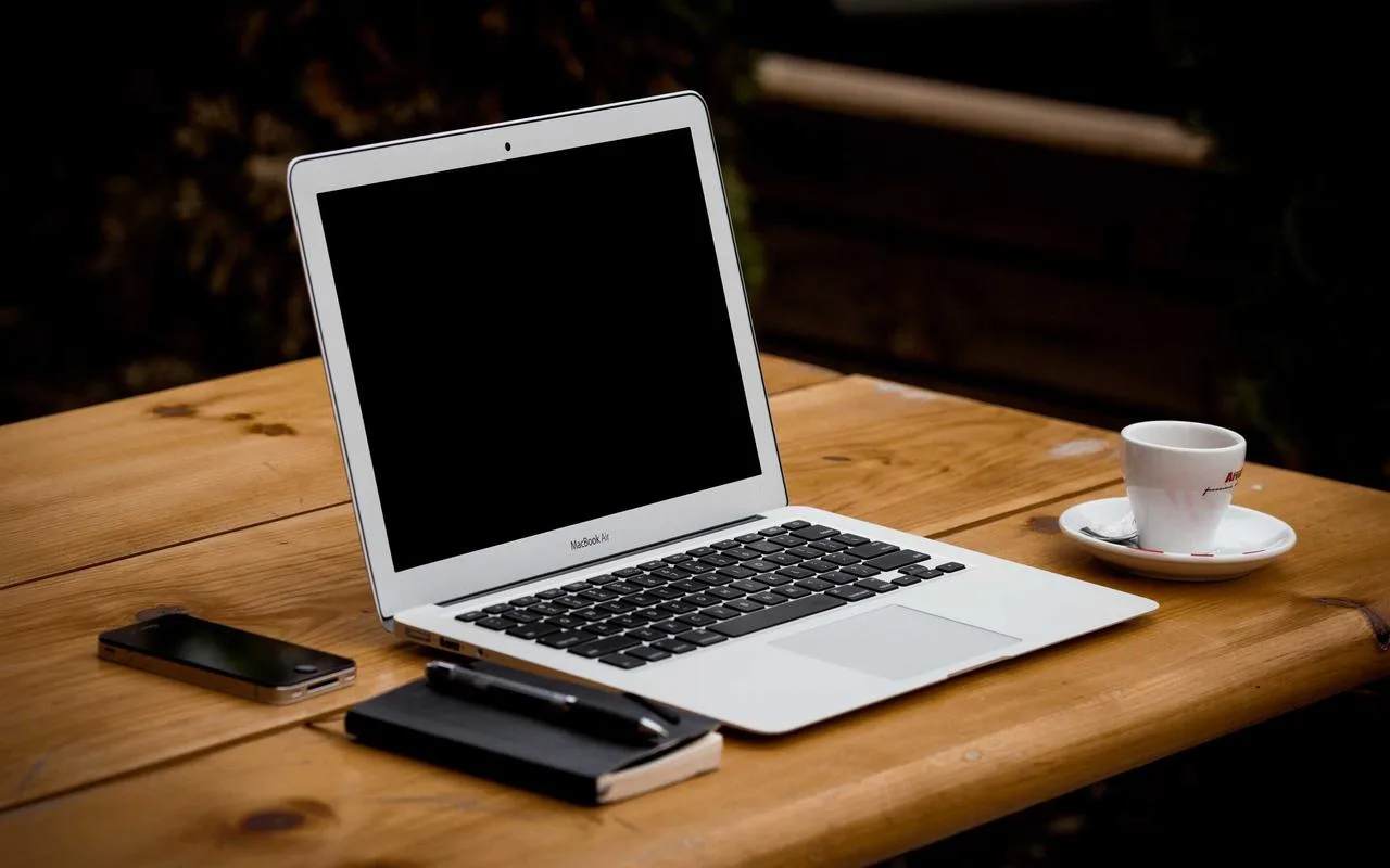Techsheba — designer workspace with premium laptop setup used for brand identity projects